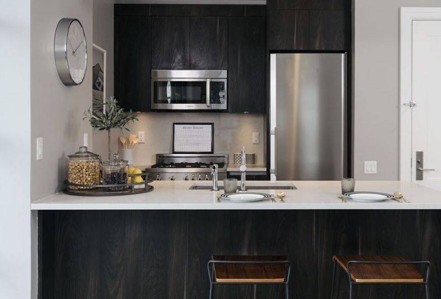 Welcome to The Jackson, where sleek and modern design mesh seamlessly with classic industrial loft space living.