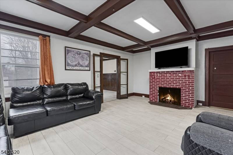 Offering approximately 4, 000 square feet of living space, this expansive residence features 8 9 bedrooms and 4 full bathrooms across three finished levels plus a basement, set on a ...