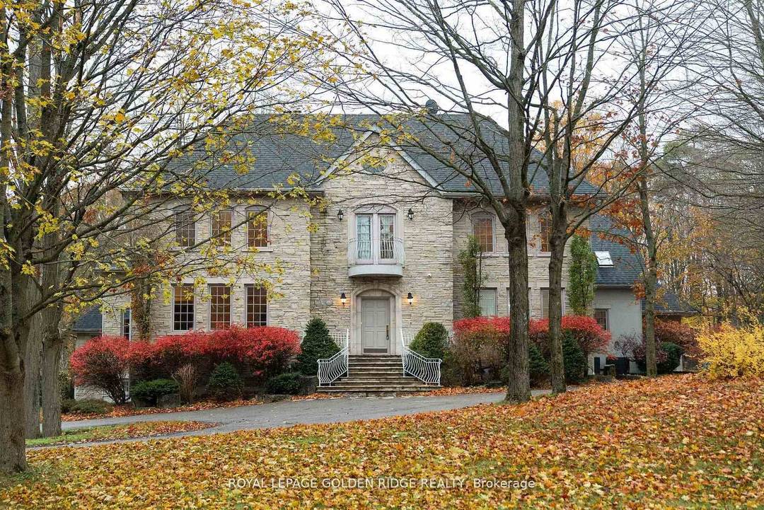 Exceptional 6, 644 sq ft above grade Forest Hill Estate nestled on 1.