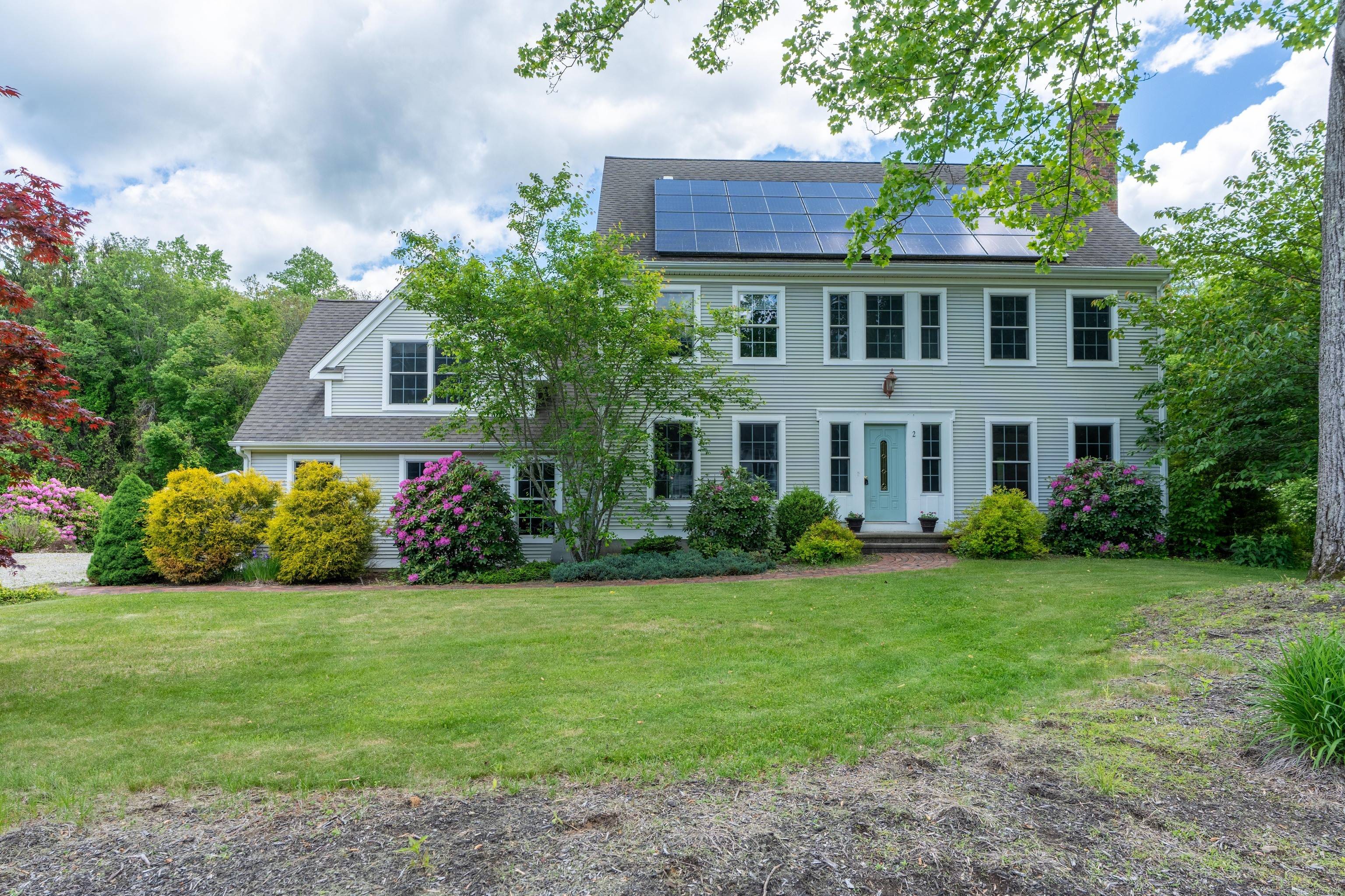 Located on an extremely quiet cul de sac, off of one of the prettiest roads in East Haddam, is this expansive Colonial.