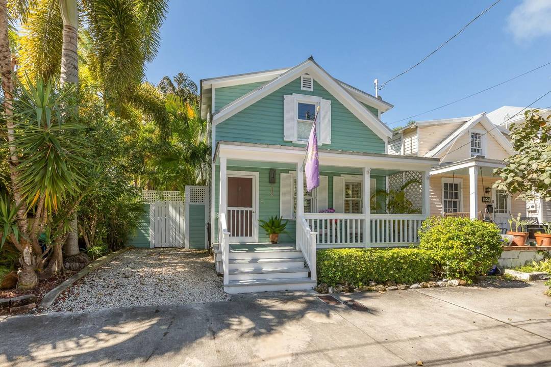 Traditional key West home impeccably maintained, boasts three bedrooms, three full baths with plenty of closets throughout the home.