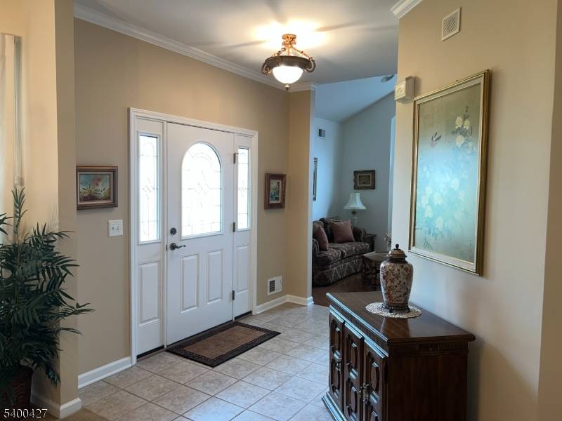 Charming Ranch Style Home in a vibrant 55 Community.