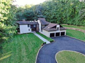 You'll love this home for its modern amenities and new renovations that include a gourmet kitchen, stunning master bath along with a new driveway and garage doors.