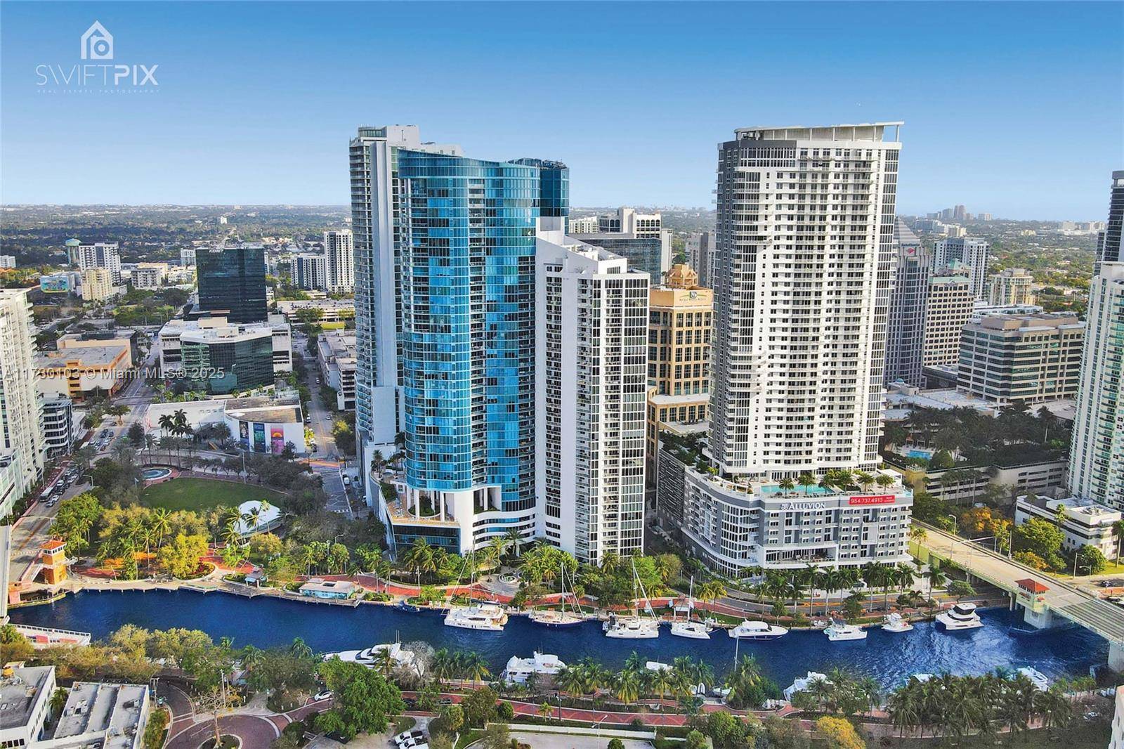 Completely re imagined contemporary riverfront Sofo with interior walls of glass amp ; open concept with huge New River amp ; park views in landmark Las Olas River House.