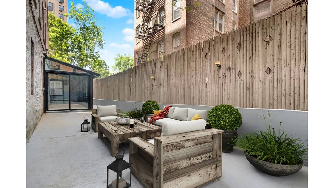 This special 2 bedroom residence with huge private outdoor space and in unit laundry on the Upper West Side is an absolute must see !