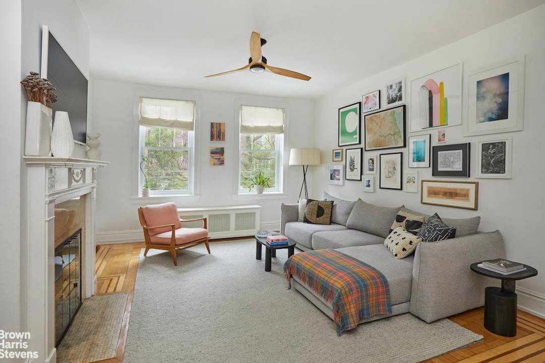 Architecturally designed for modern New York living, this elevated first floor 2 bedroom, 2 bath residence stands apart within the coveted Elm Court.