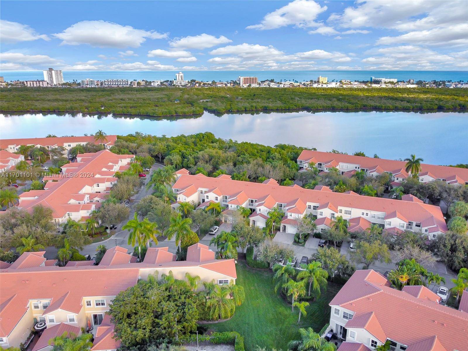 HIGHLY DESIRED WEST LAKE VILLAGE GATED COMMUNITY SPACIOUS TOWNHOME 3 BED 2 BATH UPSTAIRS AND 1 2 BATH DOWNSTAIRS WITH 1 CAR GARAGE AND DRIVEWAY TO PARK 2 CARS.