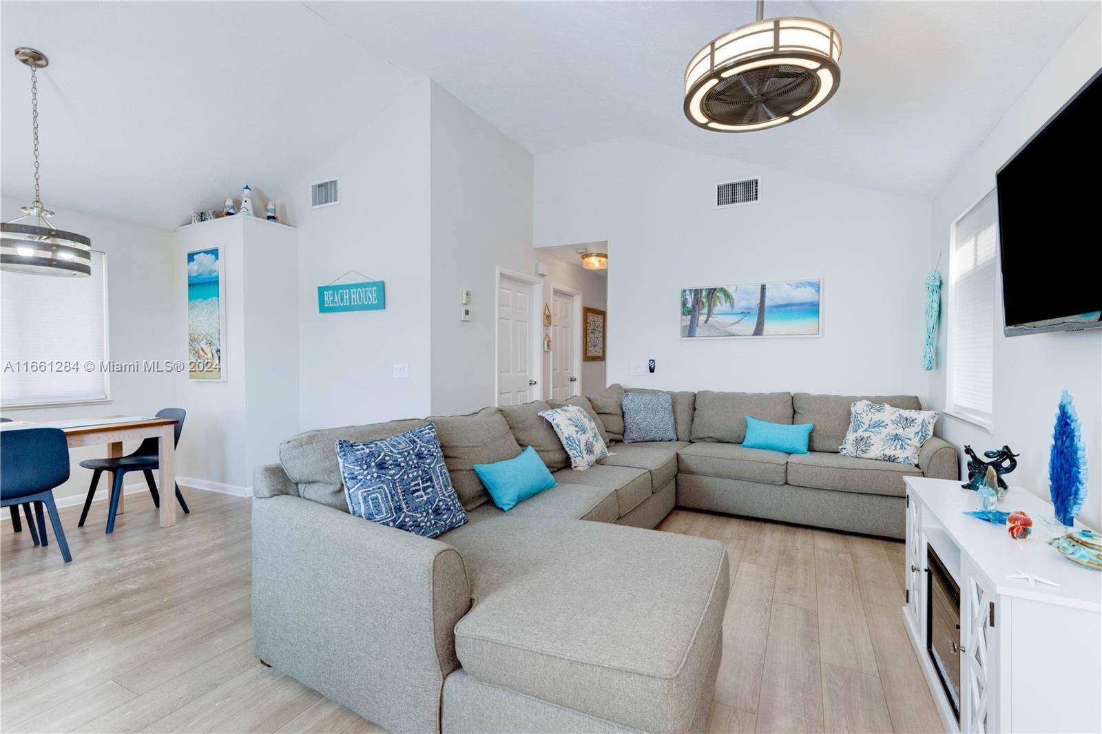 Welcome to your sun drenched escape at this charming 2 bedroom, 2 bathroom house nestled near the water's edge !