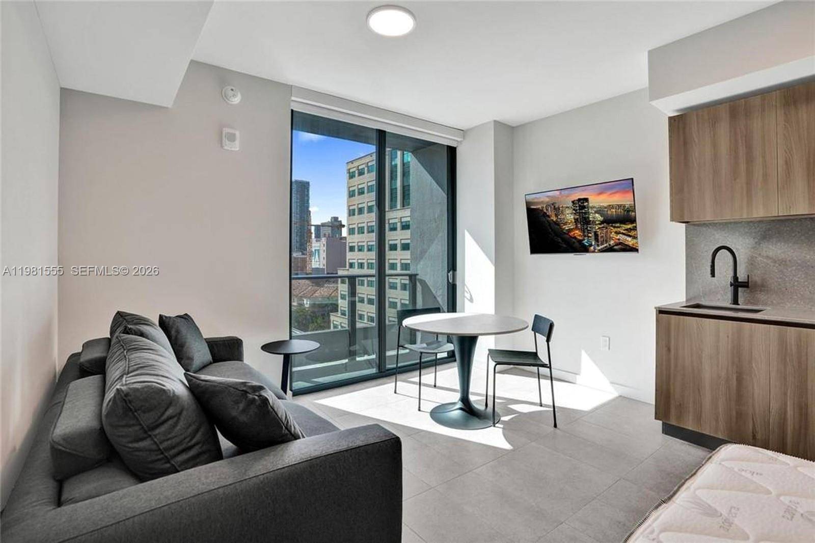 501 First Residences brand new modern luxury studio, which offers 385 SF of living space, an efficient open floor plan, floor to ceiling windows, and a private balcony.