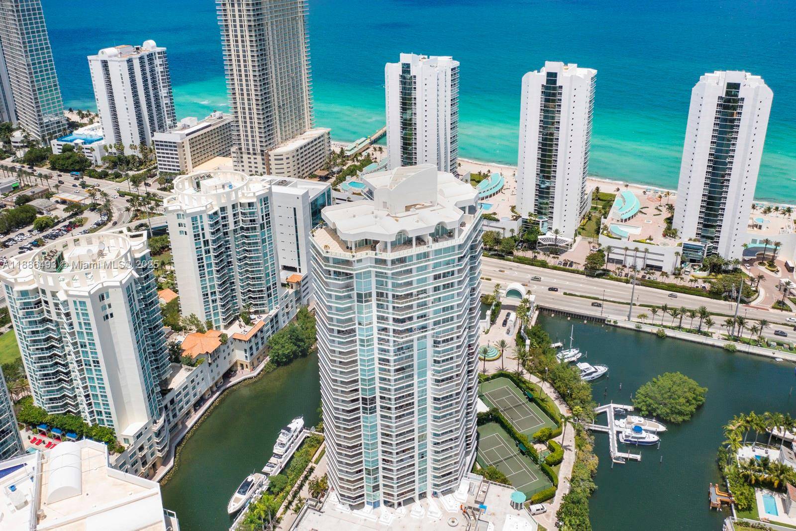 Fully and Highly Renovated Resort living panoramic views from this 2BR, 2BA den condominium on the 18h floor of Oceania Island, Tower IV.