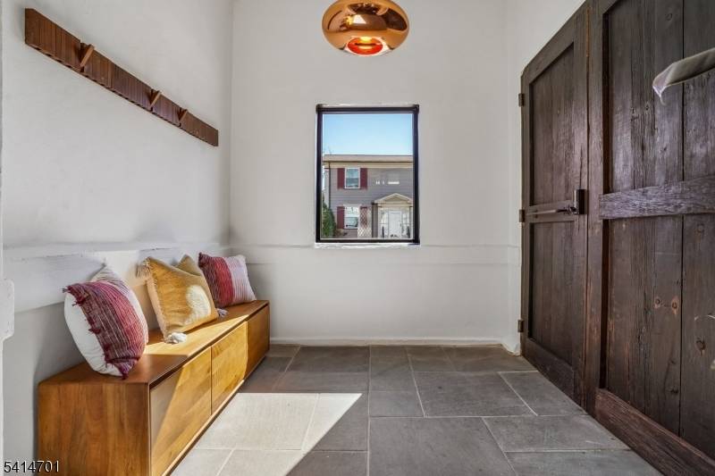 This exquisite home in the heart of Maplewood blends timeless charm with modern style.