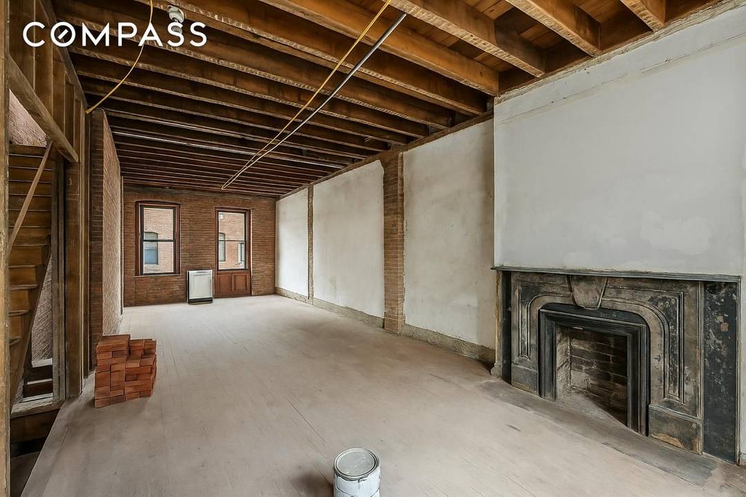 A rare opportunity to acquire a 20 foot wide townhouse on one of the West Village s most picturesque and desirable blocks.