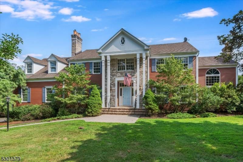 Welcome to this classic center hall Colonial on over 2 acres in Chester Township's desirable Beacon Hill.