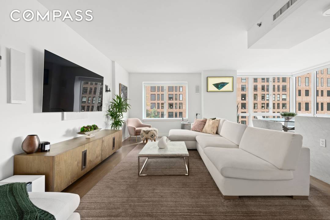 The sights of the city unfold at your feet in this sun filled two bedroom, two bathroom condominium with private outdoor space, perfectly positioned at the intersection of the East ...