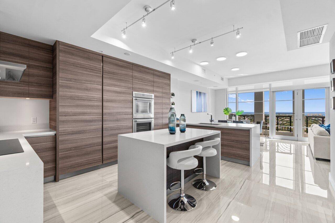 Experience luxury living at its finest in this breathtaking 12th floor penthouse located in the heart of East Boca.