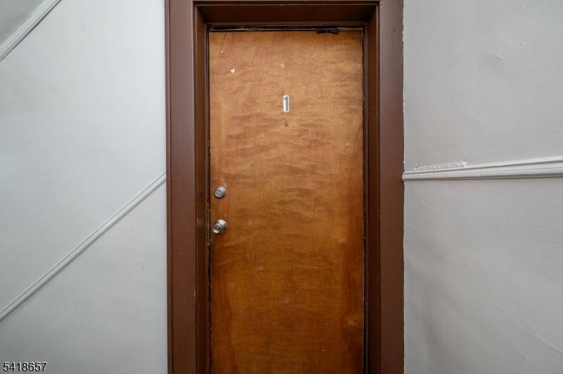 Excellent Investment Opportunity in this sprawling 4 Unit Multifamily Home with Bonus Finished Basement in thriving Newark !