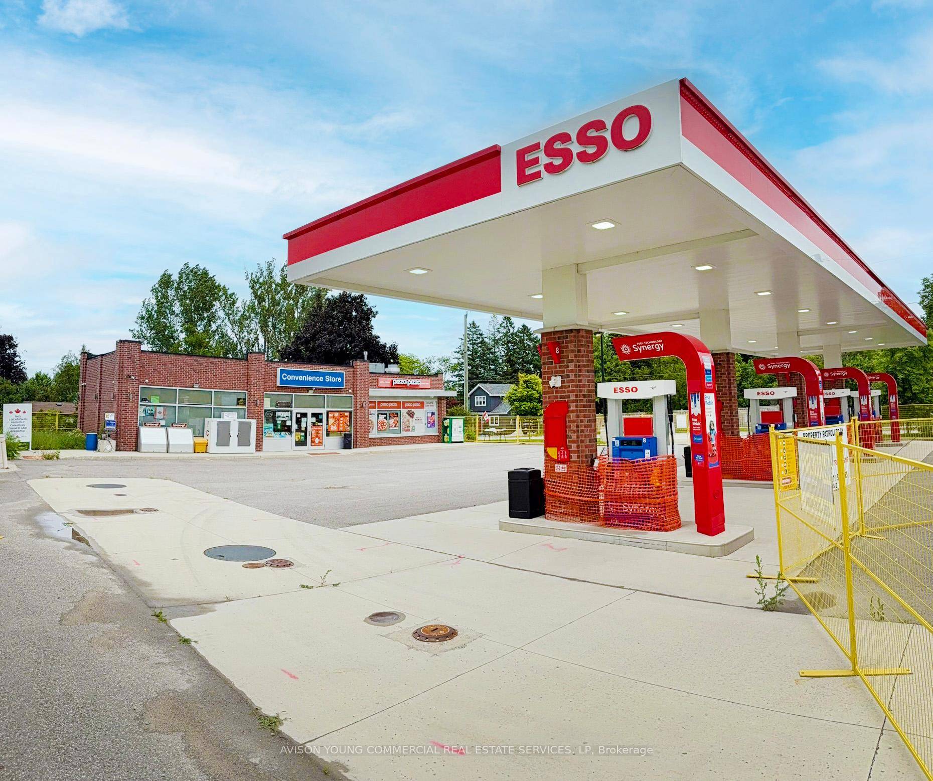 Modern ESSO branded gas station and C store facility built in 2019, along with a Pizza Pizza internal QSR unit.