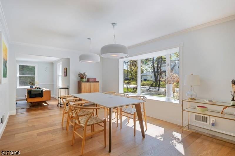 Welcome to 60 Woodland Road, a beautifully crafted 3, 000 sq ft home perfectly situated in the serene landscape of Mendham Township.
