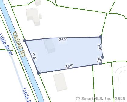 Vacant lot in well traveled commercial area.