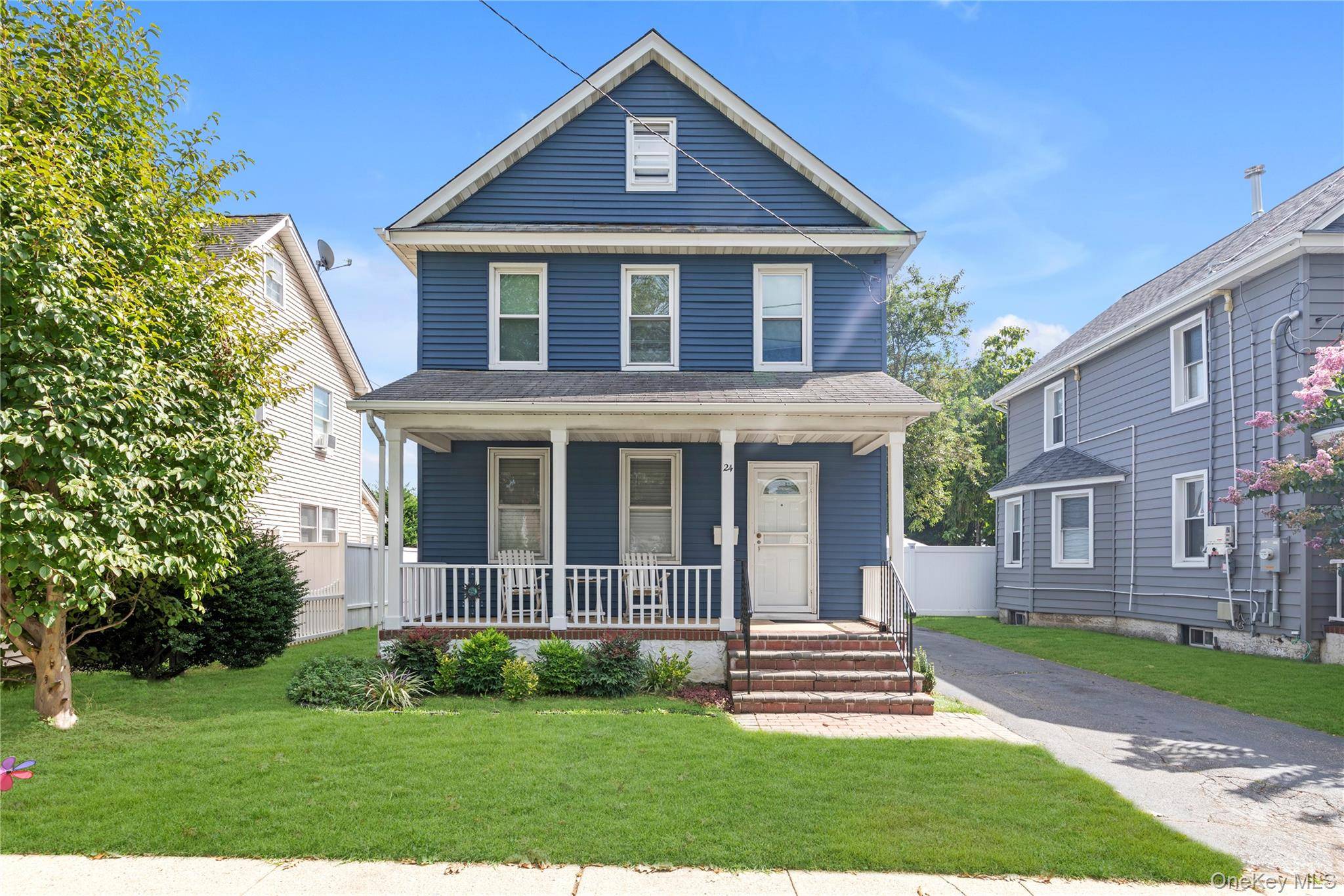Charming Custom Built Colonial in Westbury s Desirable West Village Section Step onto the inviting open porch and into a home filled with warmth and character.