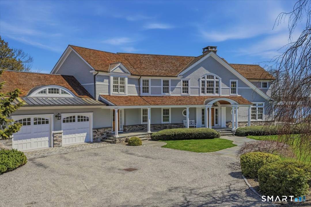 Set along one of Essex's most coveted stretches of River Road, this exceptional waterfront estate offers a rare blend of understated elegance, privacy, and Connecticut River waterfront.