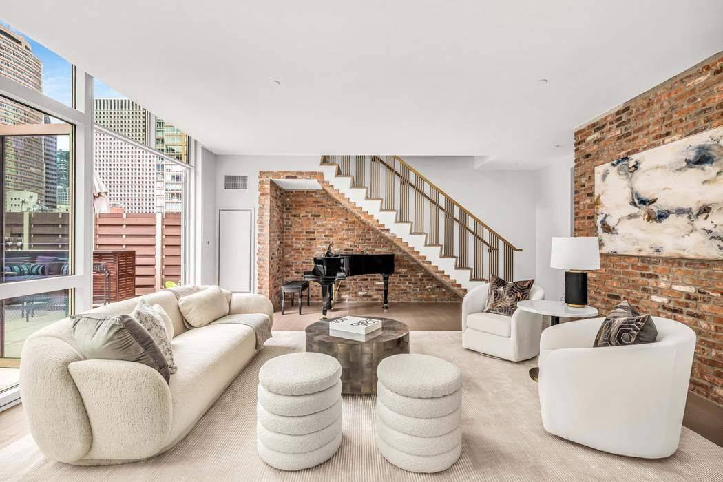 Spectacular Duplex Available Welcome to305 East 51st Street, where luxury and elegance meet in this stunning loft like 4 bedroom, 4.