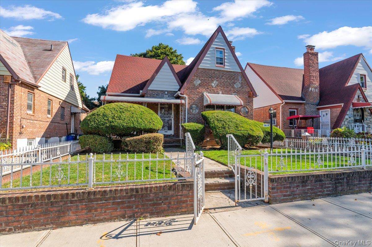 Four bedroom 2 bath detached Tudor, wood floors throughout, except kitchen hallway amp ; bath, fireplace in living room, formal dining room, two bedrooms on first floor, two on second ...
