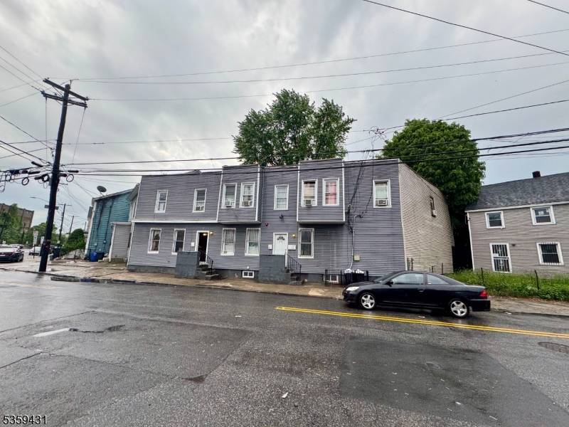 Recently Renovated Four Family Home Move in Condition Renovated Unit Vacant Residentially Located Features Hardwood Floors, Central Air much more Low Property Taxes