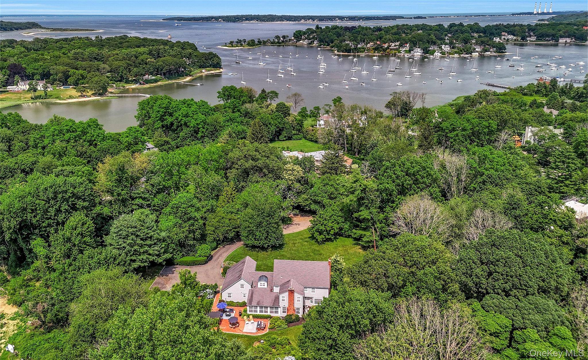 A Lloyd Harbor classic and timeless Colonial, tastefully and elegantly designed.