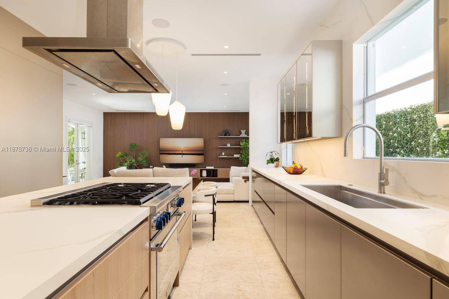 Impeccably renovated 2008 Mediterranean residence in North Coconut Grove with 5, 234 SF total, and 4, 455 SF of living.