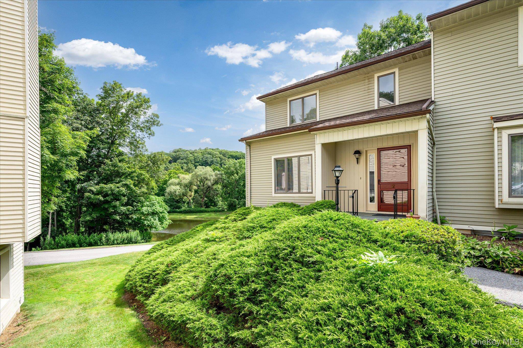 Lakeside Living at The Willows Stylish 2 Bedroom End Unit Townhome with Resort Style Amenities Welcome to this beautifully maintained 2 bedroom, 2.