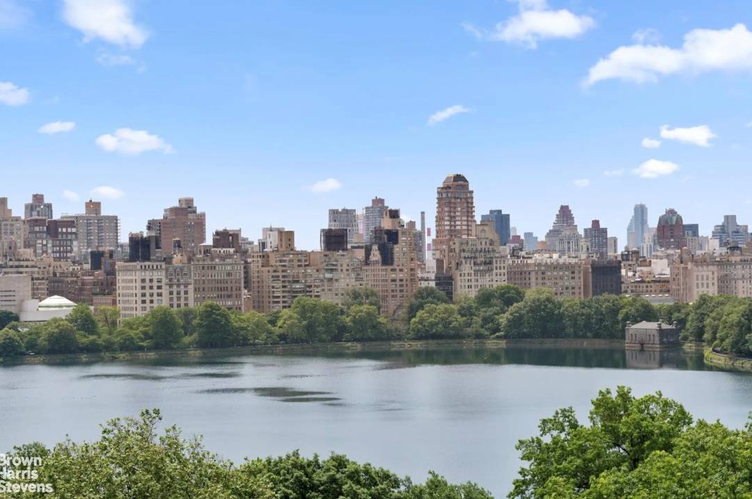 Spectacular Central Park and Reservoir views from this high floor corner prewar CONDOMINIUM.