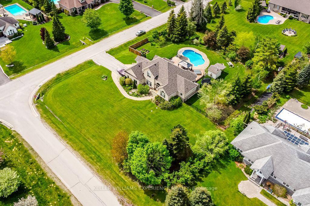 Welcome to your dream home in the heart of Shanty Bay, where luxury meets lifestyle !