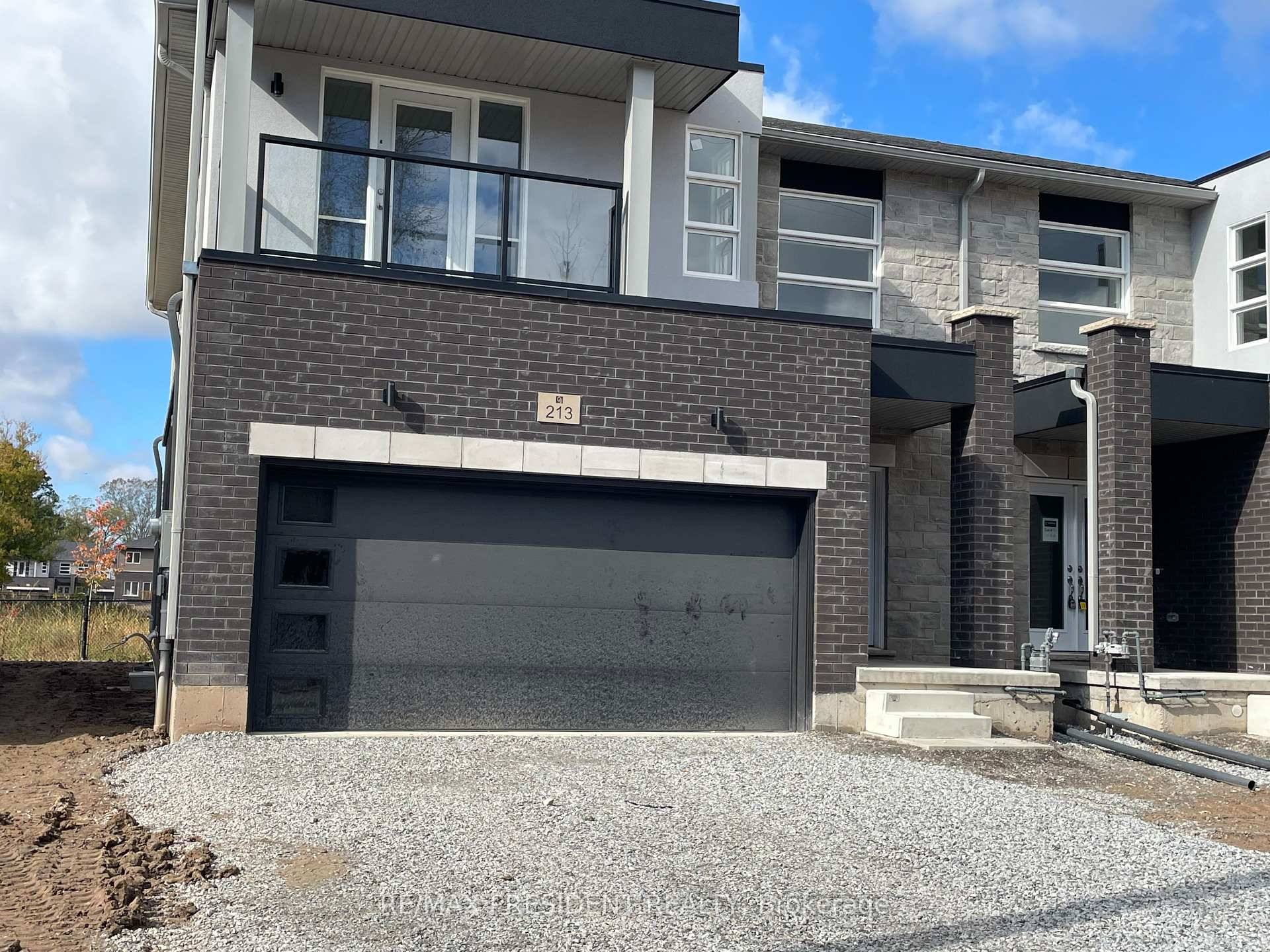 Welcome to 213 Wells Rd, New Modern 2 Storey Semi Detached home, Double car garage, Double door main entrance.
