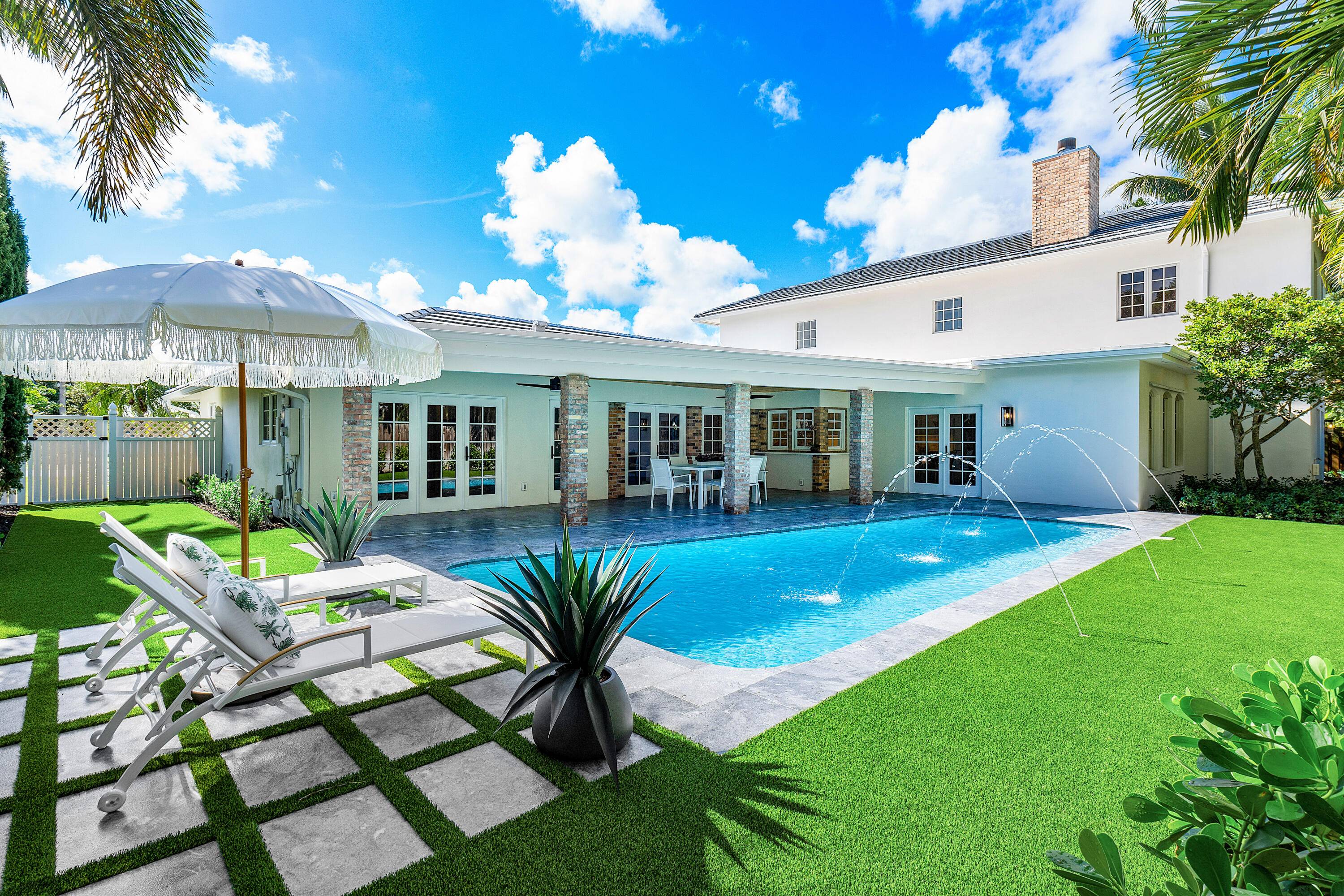 Welcome to 17 NW 25th Avenue, an exquisite residence in the highly sought after Lake Eden neighborhood of Delray Beach.