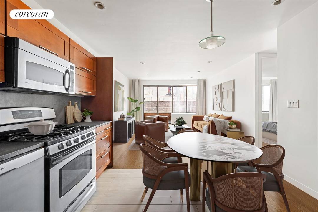 Peaceful and Quiet One Bedroom with Private Outdoor Space in a Boutique Chelsea Condo Apartment Features Open concept kitchen outfitted with wood cabinetry, abundant prep space, stainless steel appliances, dishwasher, ...
