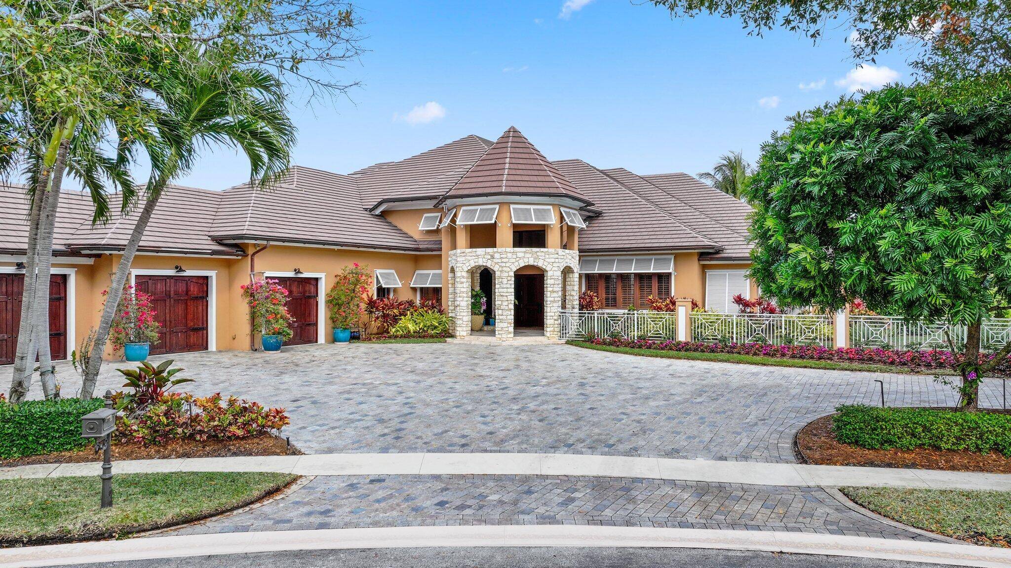 Custom one of a kind estate sitting on just under 1 acre in Bermuda Run in Broken Sound Country Club.