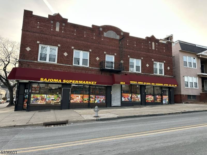 This prime mixed use building features 7 spacious apartments 2, 3 bedroom layouts and a versatile retail space, currently rented as lucrative convenient store.