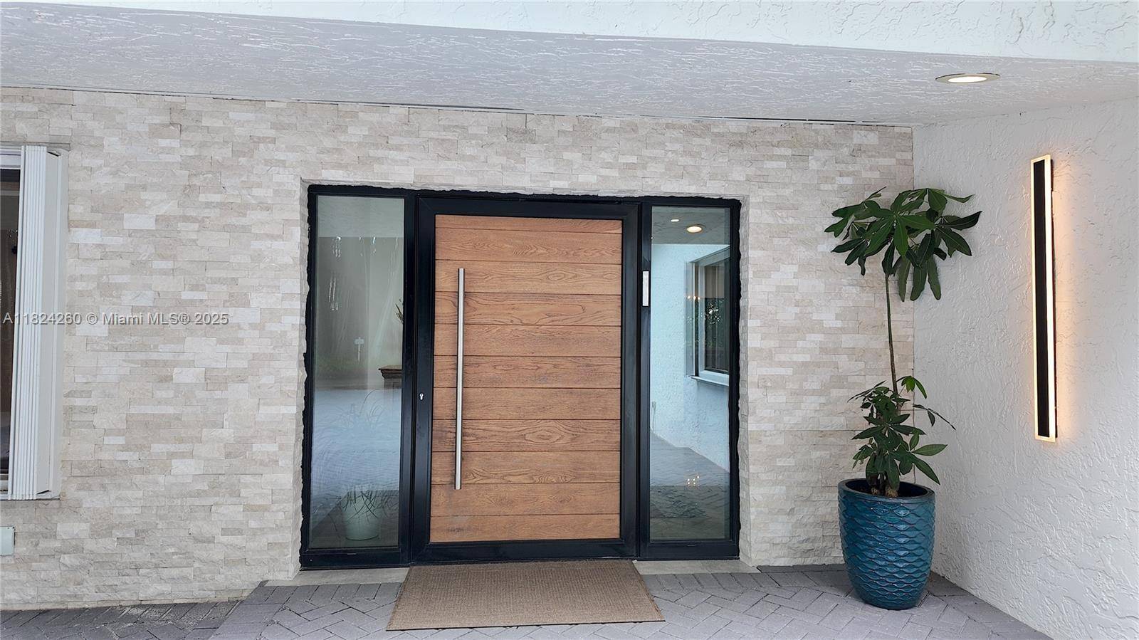 EXCEPTIONAL HIDDEN GEM, SITUATED IN ONE OF THE MOST DESIRABLE GAURD GATED COMMUNITIES IN THE HOLLYWOOD, EMERALD HILLS AREA, BOASTING OVER 5100 SQ.