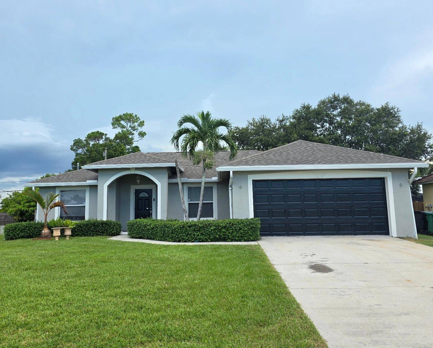 Lovely home with bright open living areas, spacious bedrooms and screened porch w private fenced back yard.
