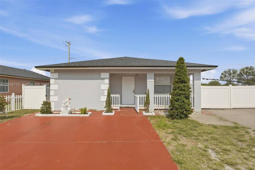Move in ready Hollywood home with a flexible layout, major updates, and serious functionality.