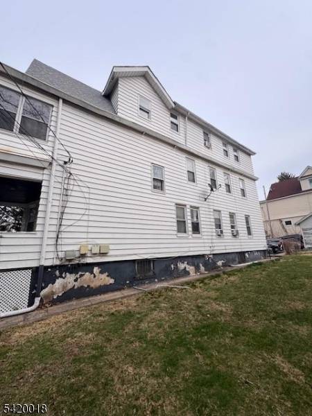 Calling all investors. Well maintained three family corner property located on a quiet, tree lined street.