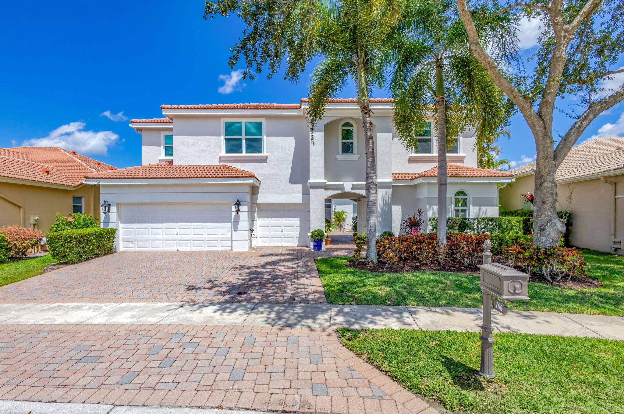Highly sought after Coutyard Model in the one of the premier resort style manned gated community in PBG.