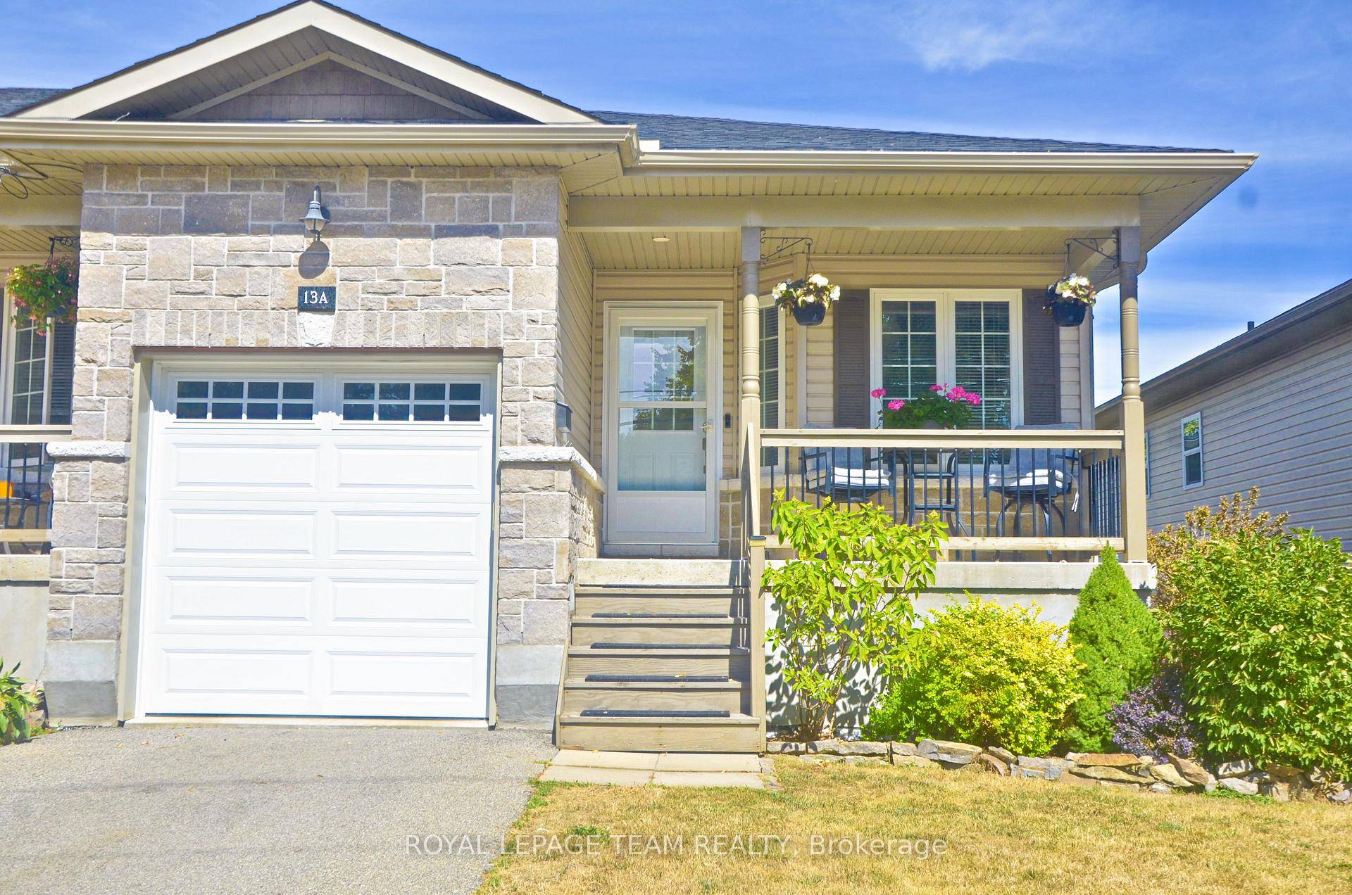 Stylish, very well kept 2 bedroom, 2 bath attached home with the walkout basement being a real wow factor.