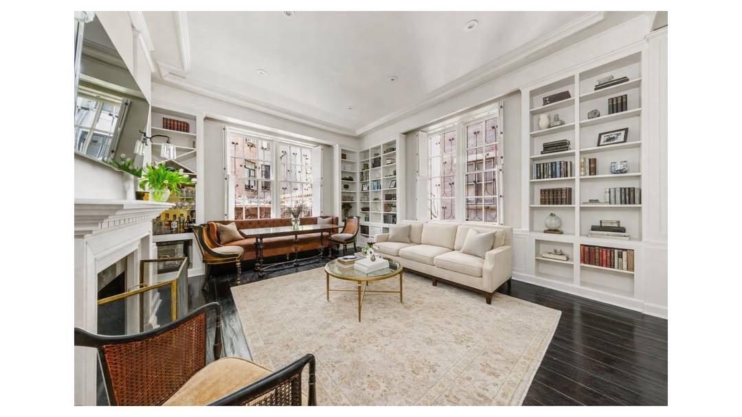 Exquisite Central Park Duplex in a Neo Georgian Mansion with Private Landscaped Garden Step back in time at 18 WEST 74TH STREET, a rare 1904 Upper West Side residence.