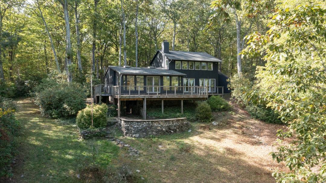 DIRECT WATERFRONT, discover the serenity of lakefront living in this rare gem nestled in the quaint and peaceful Town of Bethlehem.