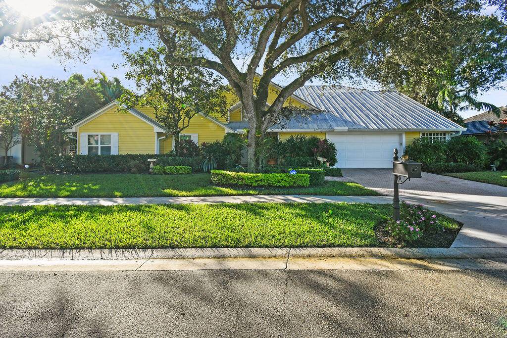 SELLER MOTIVATED ! This exquisite home oozes coastal charm and timeless elegance, featuring abundant pecky cypress accents and subtle nautical touches throughout.