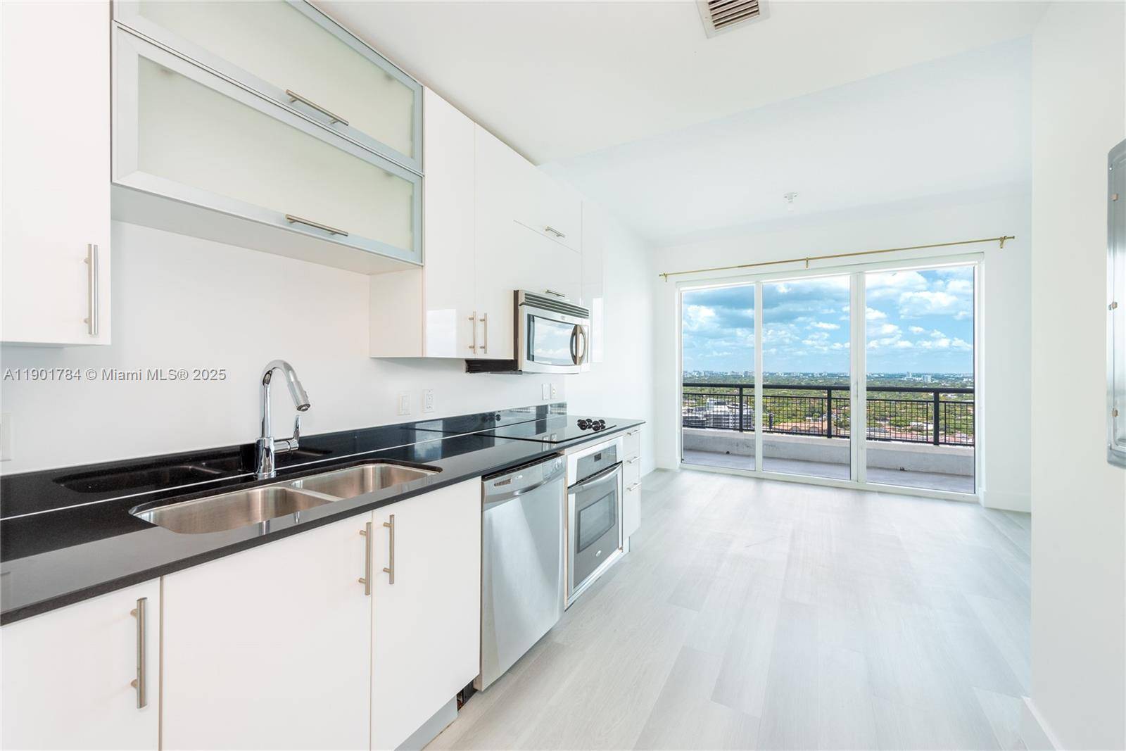 Modern studio at Infinity at Brickell featuring stunning skyline views and brand new floors.