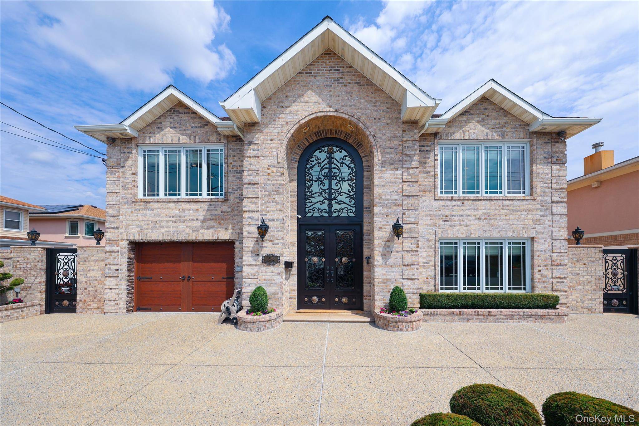 A Rare Blend of Modern Luxury and Timeless Craftsmanship This all brick home, fully redeveloped in 2006, offers 4, 000 sq.
