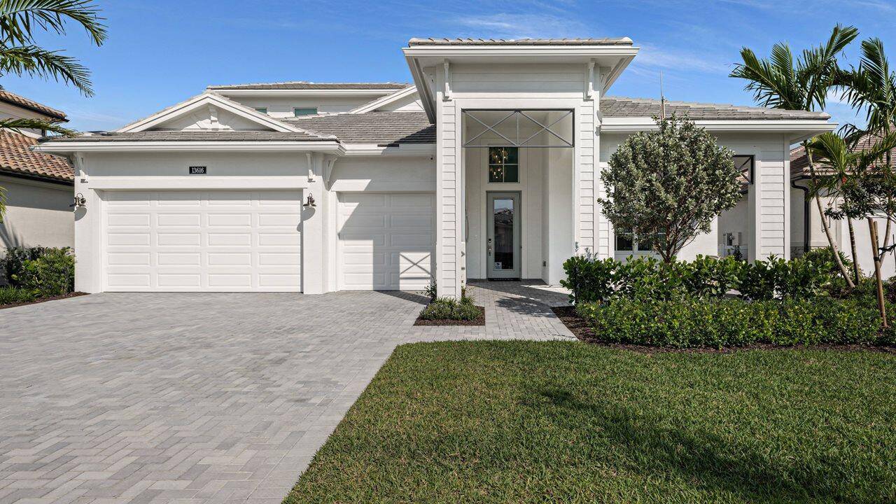 This brand new Paige floorplan built by Kolter Homes is located within the gated community of L'Ambiance at Avenir.